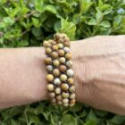 Landschap jaspis armband met aardse kleuren en natuurlijke patronen, Armband van picture jaspis stenen die rust en stabiliteit uitstralen, Handgemaakte landschap jaspis armband met uniek geaderde stenen, Kalmerende armband van landschap jaspis, geïnspireerd op natuurlijke landschappen, Stijlvolle picture jaspis armband voor een aardende en harmonieuze uitstraling