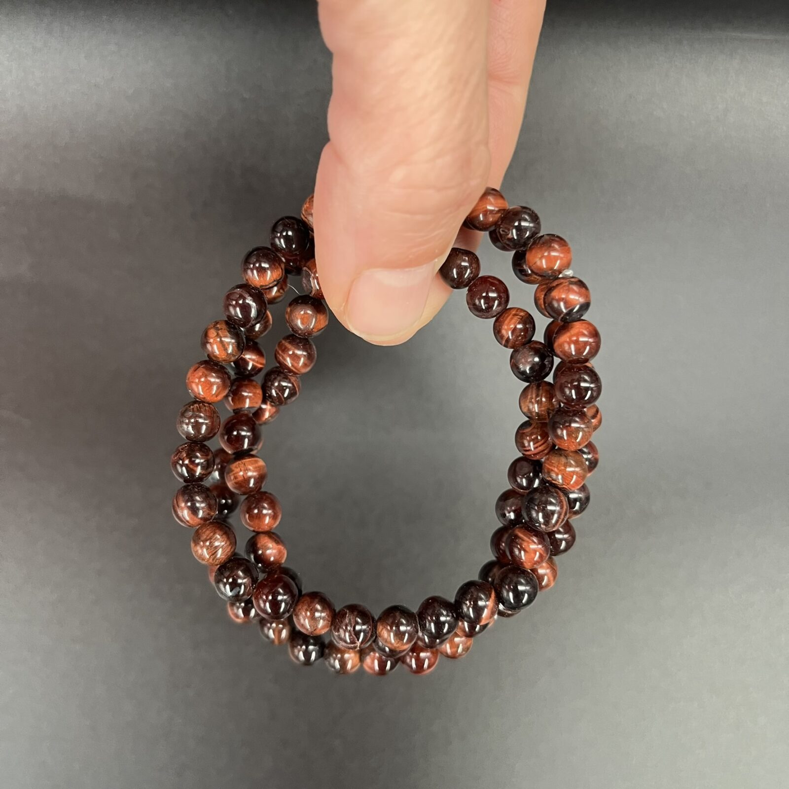 Rode tijgeroog armband 6 mm met edelsteen kralen, Spirituele armband rode tijgeroog 6 mm voor kracht en balans, Rode tijgeroog kralen armband kopen 6 mm, Elastische edelsteen armband rode tijgeroog 6 mm, Rode tijgeroog armband 6 mm met ronde kralen