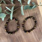 Tijgeroog trio armband 8 mm met bruine, rode en blauwe edelsteen kralen, Spirituele armband tijgeroog trio 8 mm voor bescherming en balans, Natuurlijke tijgeroog armband 8 mm in drie kleuren voor kracht en rust, Edelsteen armband tijgeroog trio 8 mm kopen voor energie en focus, Tijgeroog trio armband 8 mm die moed, kalmte en stabiliteit versterkt, Spirituele sieraden tijgeroog armband 8 mm met driekleurige werking