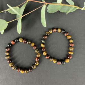 Tijgeroog trio armband 8 mm met bruine, rode en blauwe edelsteen kralen, Spirituele armband tijgeroog trio 8 mm voor bescherming en balans, Natuurlijke tijgeroog armband 8 mm in drie kleuren voor kracht en rust, Edelsteen armband tijgeroog trio 8 mm kopen voor energie en focus, Tijgeroog trio armband 8 mm die moed, kalmte en stabiliteit versterkt, Spirituele sieraden tijgeroog armband 8 mm met driekleurige werking