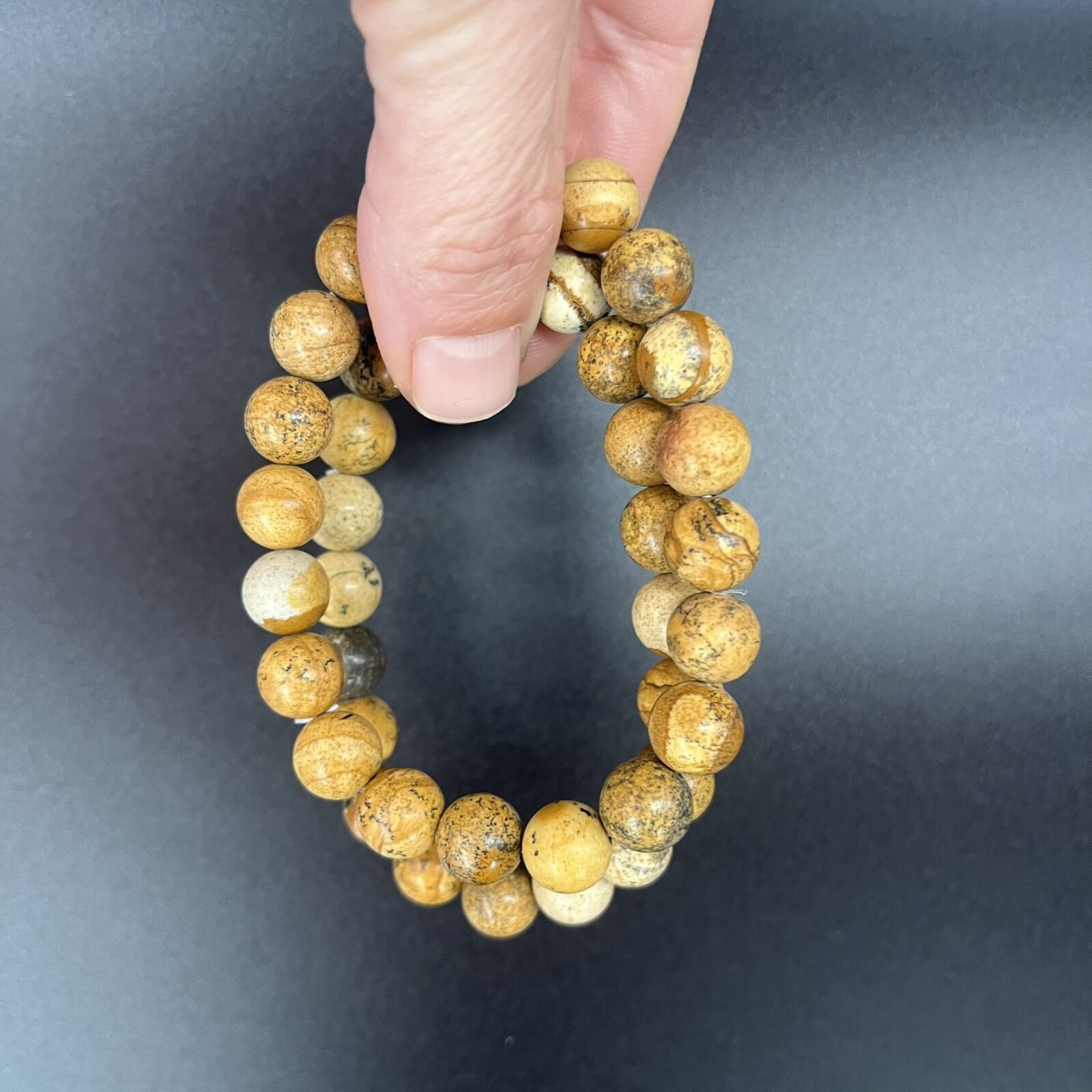 Picture jaspis armband 10 mm met natuurlijke patronen en aardse tinten, Spirituele armband picture jaspis 10 mm voor rust en balans, Natuurlijke picture jaspis armband 10 mm die stabiliteit en kracht geeft, Edelsteen armband picture jaspis 10 mm kopen voor aarding en inzicht, Spirituele sieraden picture jaspis armband 10 mm voor emotionele harmonie, Picture jaspis armband 10 mm met unieke tekeningen en kalmerende energie