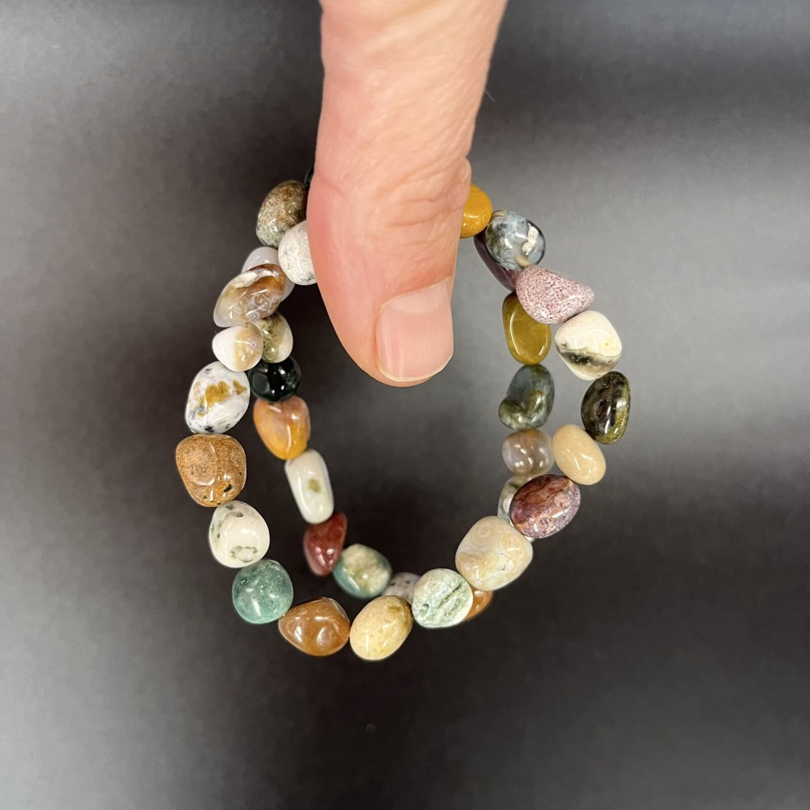 Oceaan jaspis freeform armband met natuurlijke patronen en kleuren, Spirituele armband oceaan jaspis freeform voor rust en emotionele balans, Edelsteen armband oceaan jaspis freeform kopen voor kracht en harmonie, Natuurlijke oceaan jaspis freeform armband met unieke steenstructuur, Spirituele sieraden oceaan jaspis freeform armband voor aarding en stabiliteit, Oceaan jaspis freeform armband die kalmte en verbondenheid met de natuur geeft