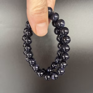 Blauwe goudsteen 10 mm armband glanzend, Blauwe goudsteen armband met fonkelende kralen, Spirituele armband blauwe goudsteen 10 mm, Edelsteen armband blauwe goudsteen nachtblauw, Blauwe goudsteen 10 mm polsband, Natuurlijke uitstraling blauwe goudsteen armband